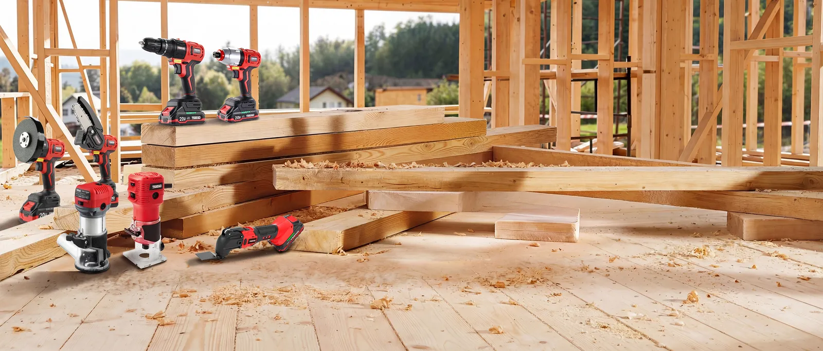 TEENO grinder, router, drill and saws laid out on lumber inside a new house frame